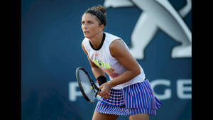 Sara Errani In Deep Concentration On The Tennis Court Wallpaper