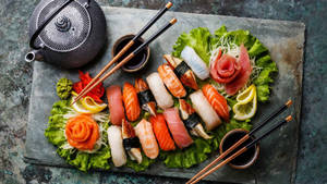 Sashimi Meal With Lettuce And Tea Wallpaper