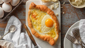 Savory Delight – Authentic Georgian Khachapuri Wallpaper