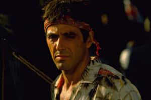 Scarface Tony Montana In Red Headwrap Wallpaper