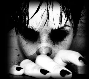 Scary Face Painted Nails Wallpaper