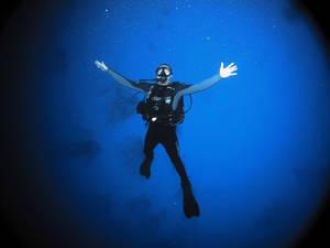 Scuba Diving Arms Wide Open Wallpaper