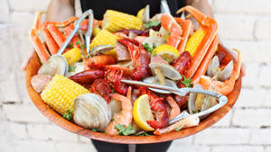 Seafood Dish On Big Plate Wallpaper