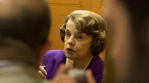 Senator Dianne Feinstein During A Focused Discussion Wallpaper