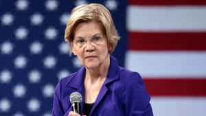 Senator Elizabeth Warren Dazzles In Violet Coat Wallpaper