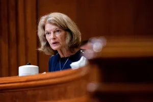 Senator Lisa Murkowski, Looking Serious During A Public Event Wallpaper