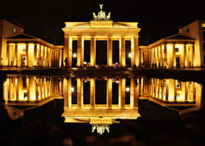 Serene Reflection Of The Brandenburg Gate Wallpaper