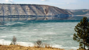 Serene View Of Lake Baikal - The Deepest Lake In The World Wallpaper