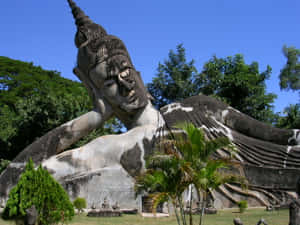 Serenity In Stone - The Buddha Park Of Vientiane Wallpaper