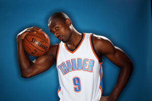 Serge Ibaka In Full Flight During A Thunder Game Wallpaper