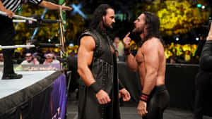 Seth Rollins Facing Roman Reigns Wallpaper