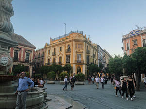 Seville Town People Wallpaper