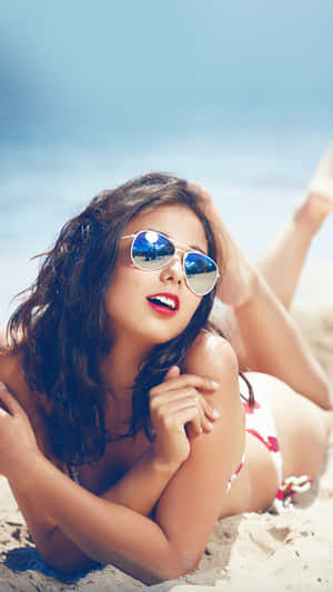 Sexy Beach Girl In Sunnies Wallpaper