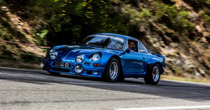 Shiny Blue Alpine A110 Wallpaper