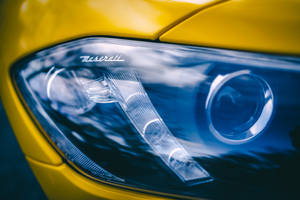 Shiny Maserati Headlight Wallpaper