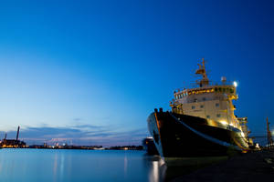 Ship In Blue Dusk Wallpaper