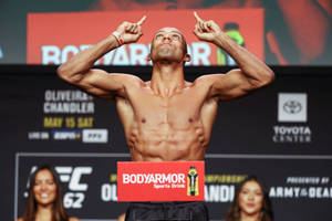 Shirtless Edson Barboza Pointing Up Wallpaper