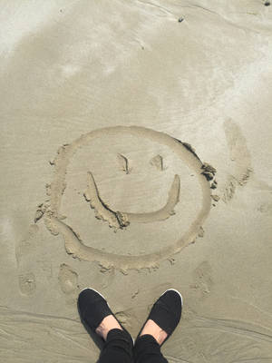 Shoes Smiley Face On Sand Wallpaper