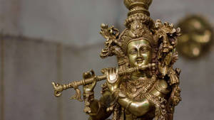 Shri Krishna Golden Statue Wallpaper