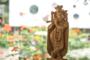 Shri Krishna Wooden Statue Wallpaper