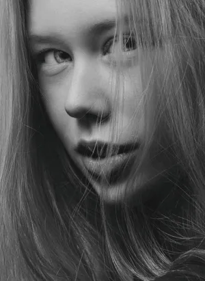 Shy Woman With Long Hair Wallpaper