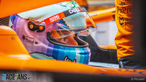 Side Photo Of Daniel Ricciardo Inside F1 Car Wallpaper