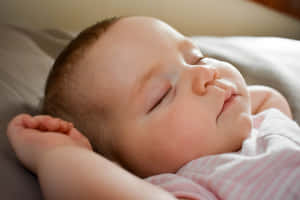 Side Profile Of A Sleeping Baby Wallpaper