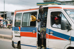 Sierra Leone Men In Colorful Van Wallpaper