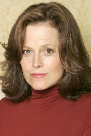 Sigourney Weaver Red Turtleneck Wallpaper