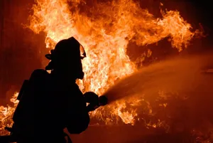 Silhouette Of A Fireman Wallpaper
