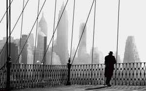 Silhouetted Serenity On The Brooklyn Bridge Wallpaper