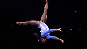 Simon Biles Backward Flip Wallpaper