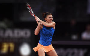 Simona Halep Holding A Racket Wallpaper