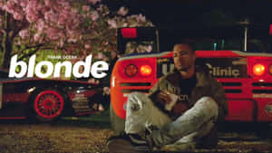 Singer-songwriter Frank Ocean Surrounded By Technology Wallpaper