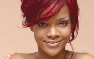 Singer-songwriter Rihanna Smiles Joyfully Wallpaper