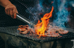 Sizzling Churrasco Feast On Fire Wallpaper