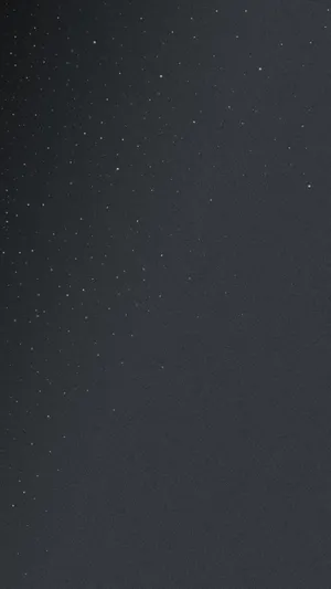 Sleek And Stylish Black Iphone 5s With A Glittering Texture. Wallpaper