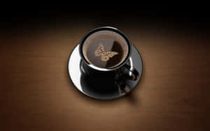 Sleek Black Coffee Cup Contemplation Wallpaper