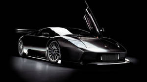 Sleek Black Lamborghini Wallpaper