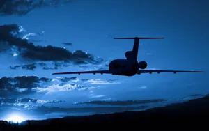 Small Airplane Silhouette During Sunrise Wallpaper