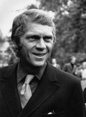 Smiling American Actor Steve Mcqueen 1969 Portrait Wallpaper