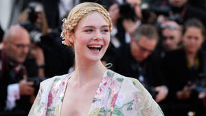 Smiling Elle Fanning Wallpaper