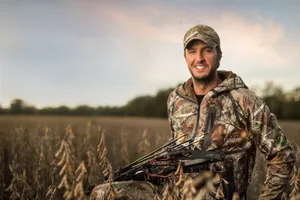 Smiling Man In Hunting Camo Wallpaper