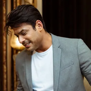 Smiling Sidharth Shukla In Gray Suit Wallpaper