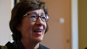 Smiling Susan Collins Wallpaper