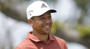 Smiling Widely Xander Schauffele Wallpaper