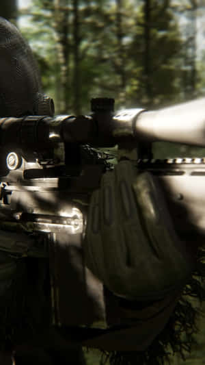 Sniperin Camouflage Holding Rifle Wallpaper