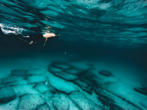 Snorkeling Rock Formations Wallpaper