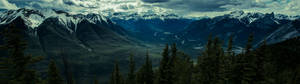 Snow Capped Mountains On A Winter Day Wallpaper