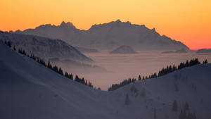 Snow Mountain During Sunset Wallpaper